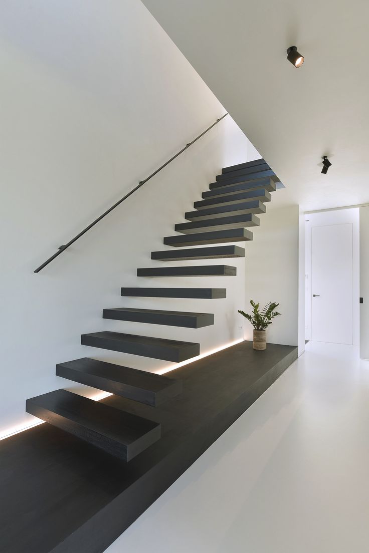 Escalier suspendu aspect beton noir Monolith